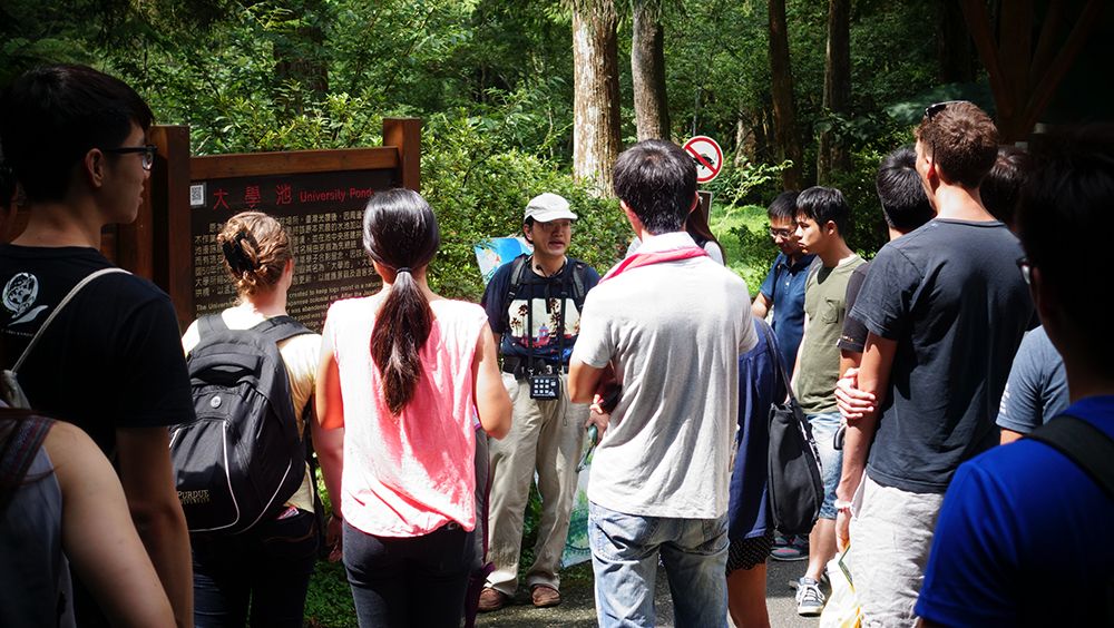Instructor introducing ecological engineering methods to BACT students at the Experimental Forest, Xitou