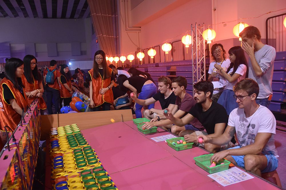 Students play the jumping ping-pong game.