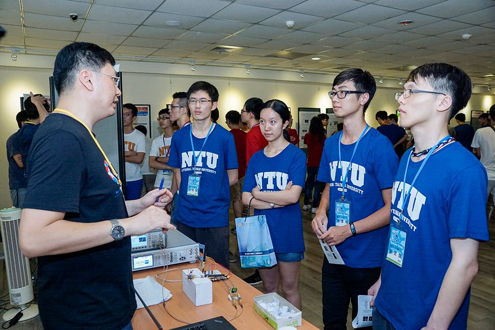 Students visit booths set by ICS labs.